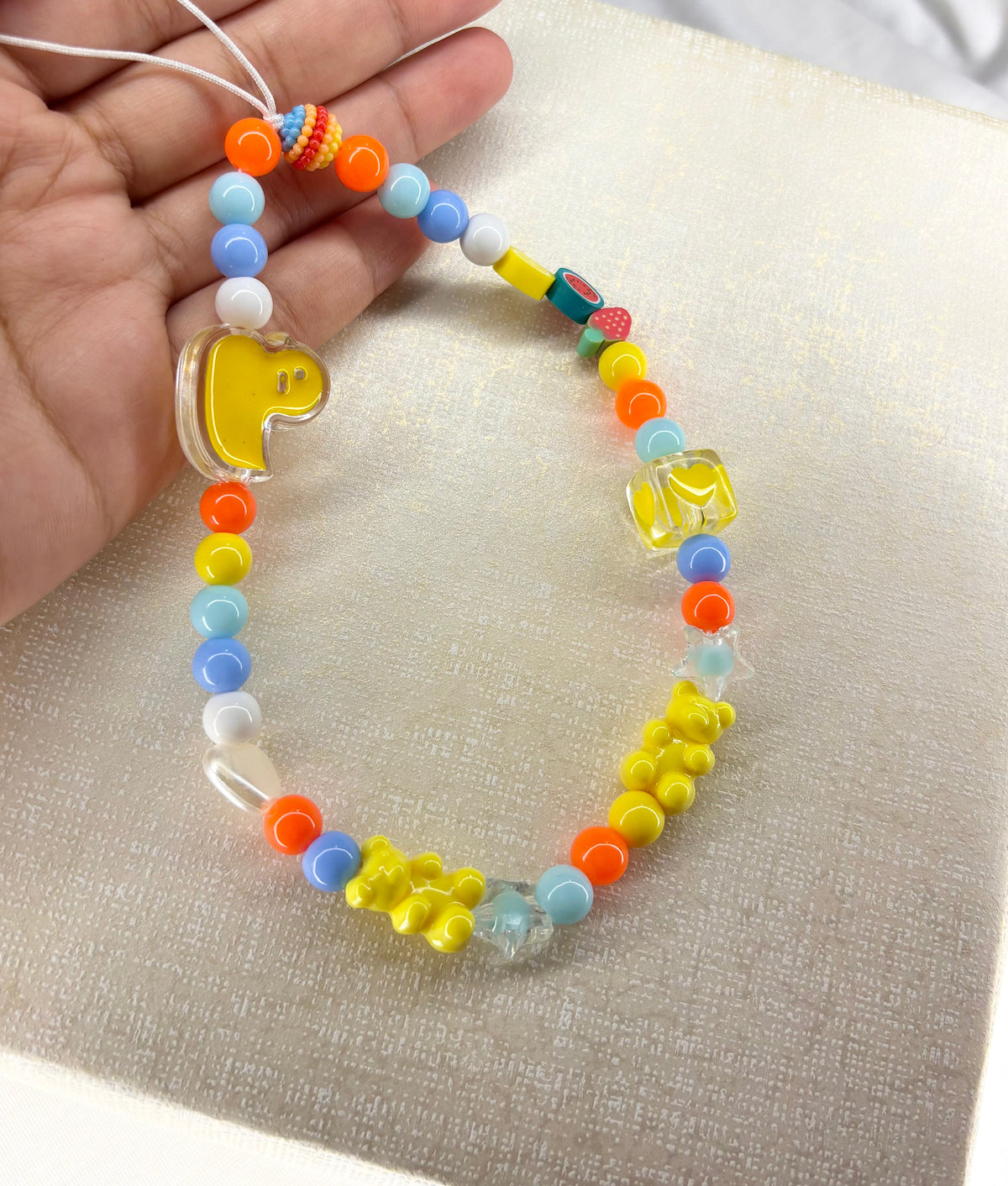 Cheerful Curvy Edge Beads Phone Charm